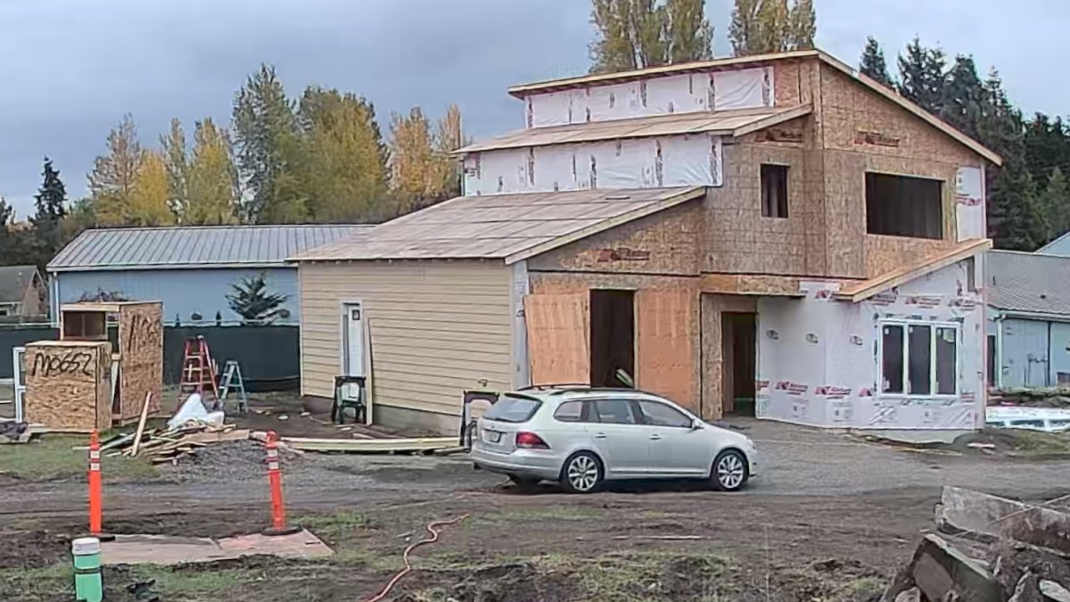 The Stratton under construction at 3920 San Juan Avenue, Port Townsend, WA: garage siding finished