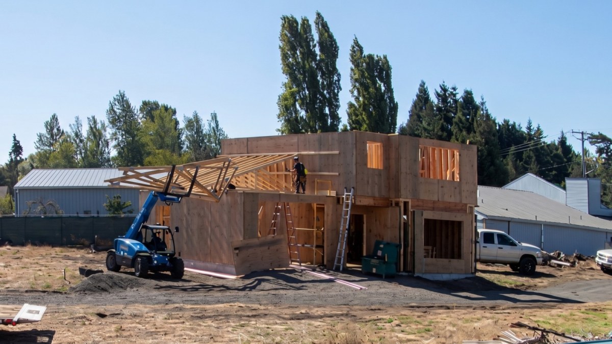 The Stratton under construction at 3920 San Juan Avenue, Port Townsend, WA: setting the garage roof trusses